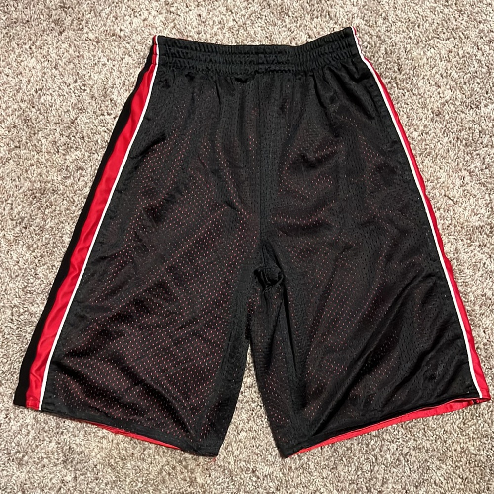 Red and black reversible basketball shorts